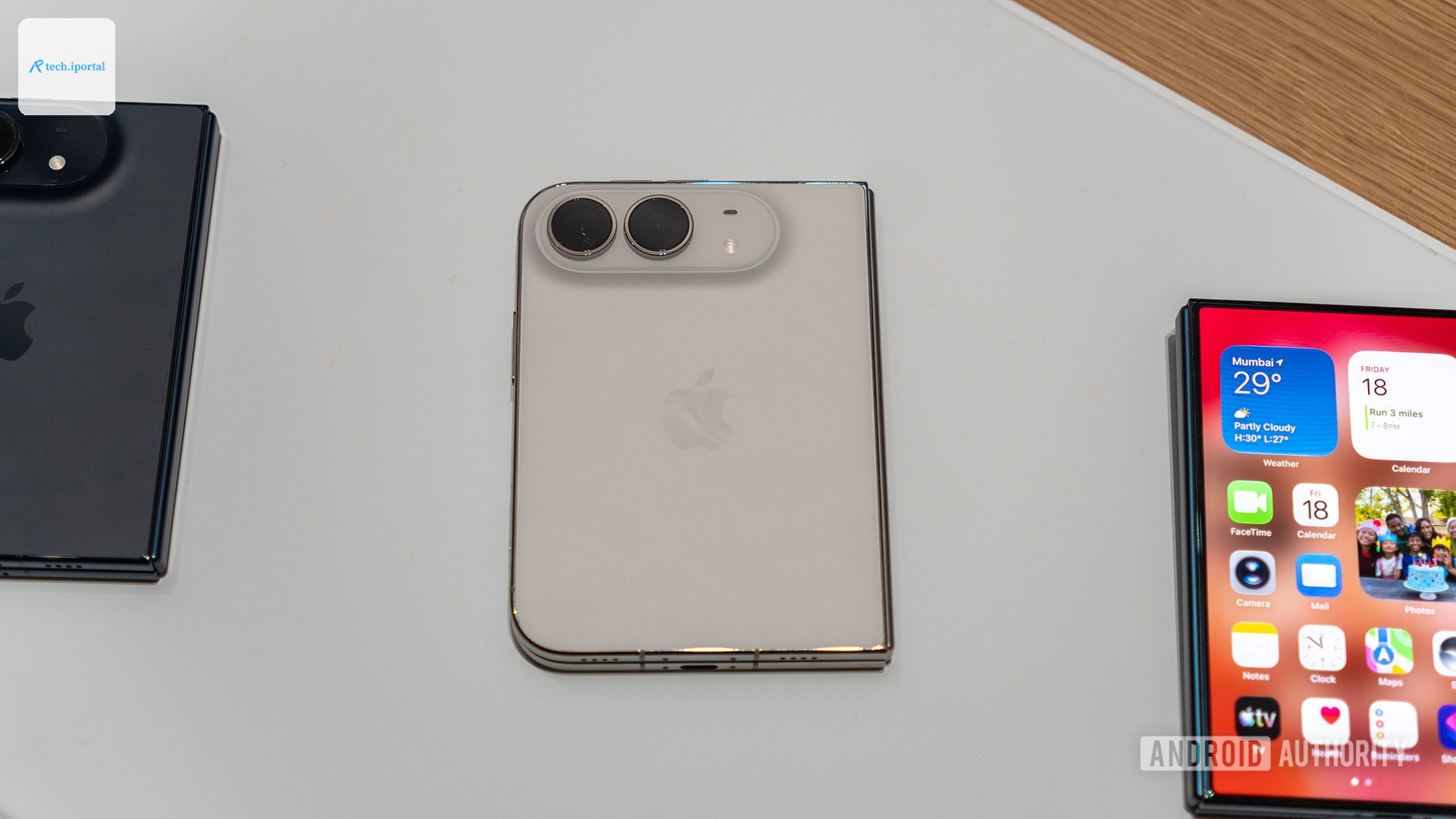 Apple iPhone Duo Hands On White color alonside black and cover display