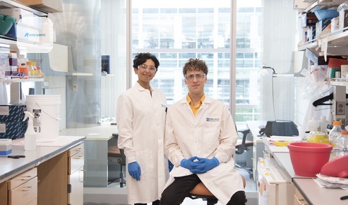 Sonia Vallabh and Eric Minikel in their Broad Institute lab.