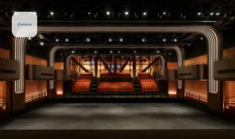 Apple Music Inside Apple Music's new music venue in London. The photo shows tiered seating and staggered boxes for an elevated view of the stage. The back wall is made of glass and offers views of an