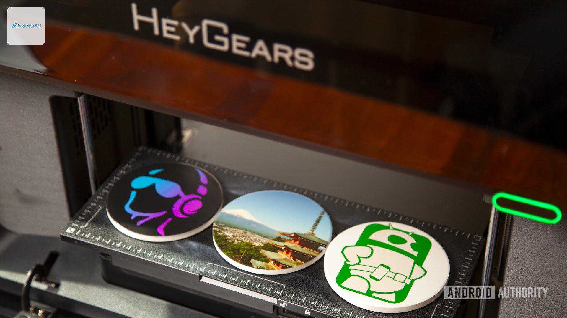 HeyGears G1X full-color 3D printer with completed coasters with 2D UV printed designs and photo