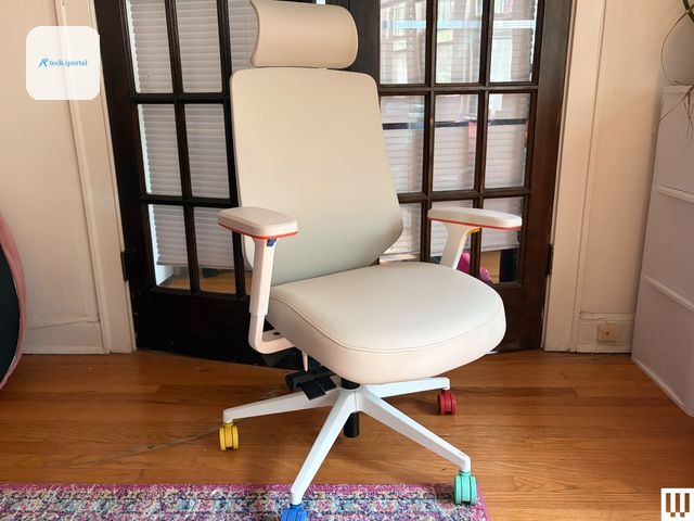 Image may contain Furniture Chair Indoors Office and Office Chair