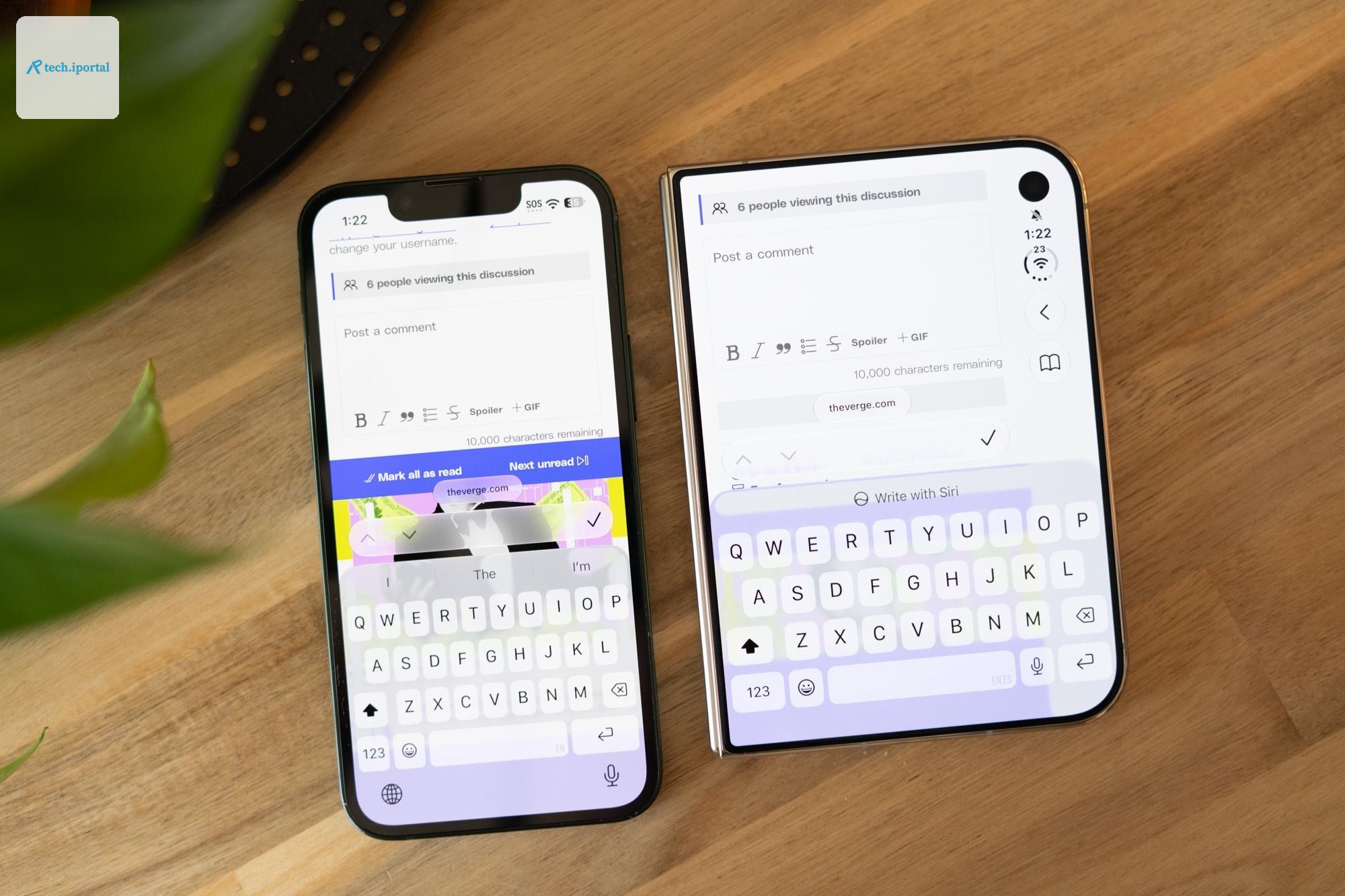 An iPhone 13 Mini next to the much wider iPhone Duo, comparing the two phones’ keyboards.