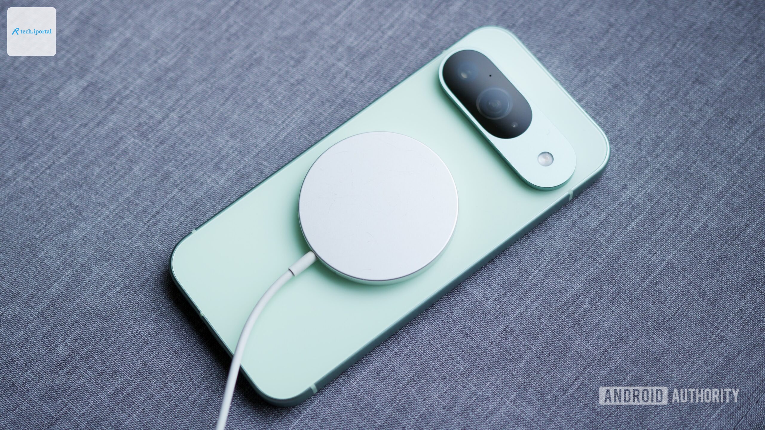 A Google Pixel 9 with a MagSafe charging puck on its back.