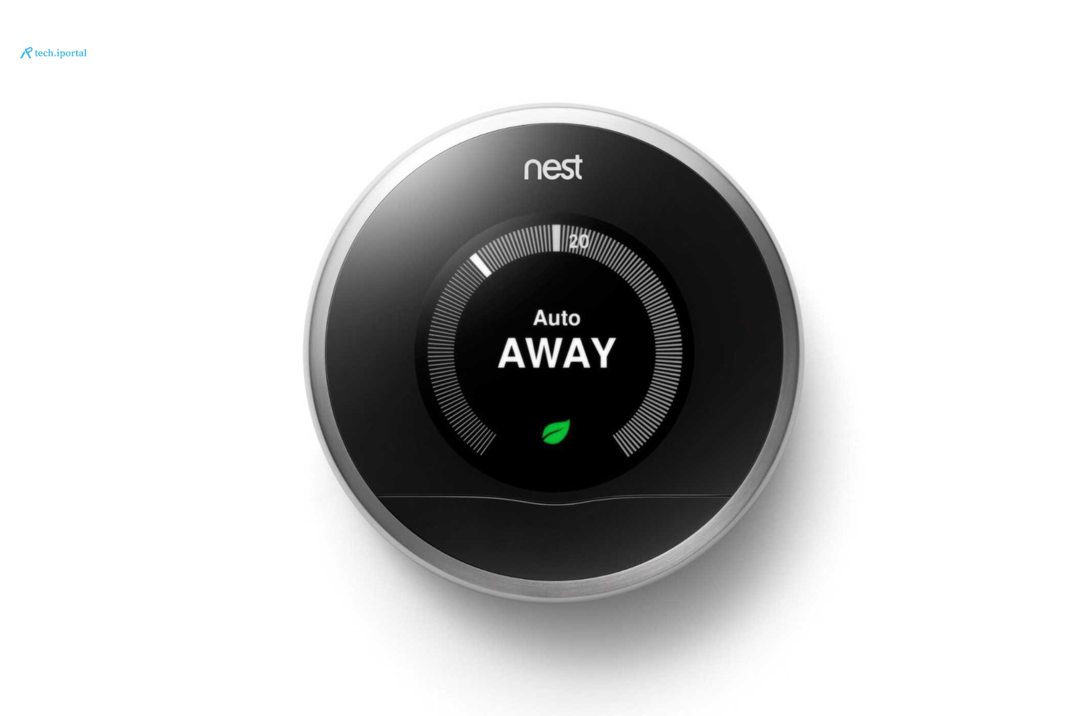 A first-generation Nest learning thermostat in a press image.