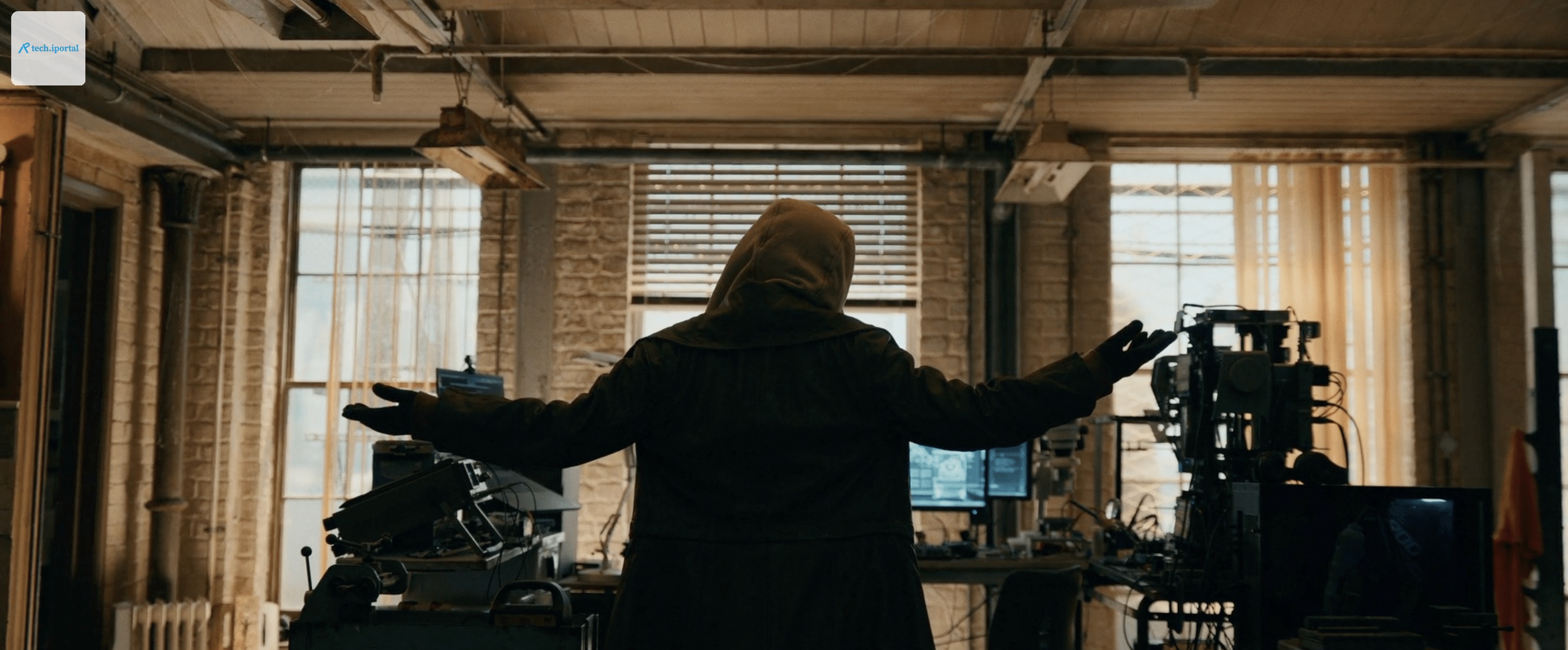 A teenage girl in a hoodie and jacket holding her arms outstretched in a living room.