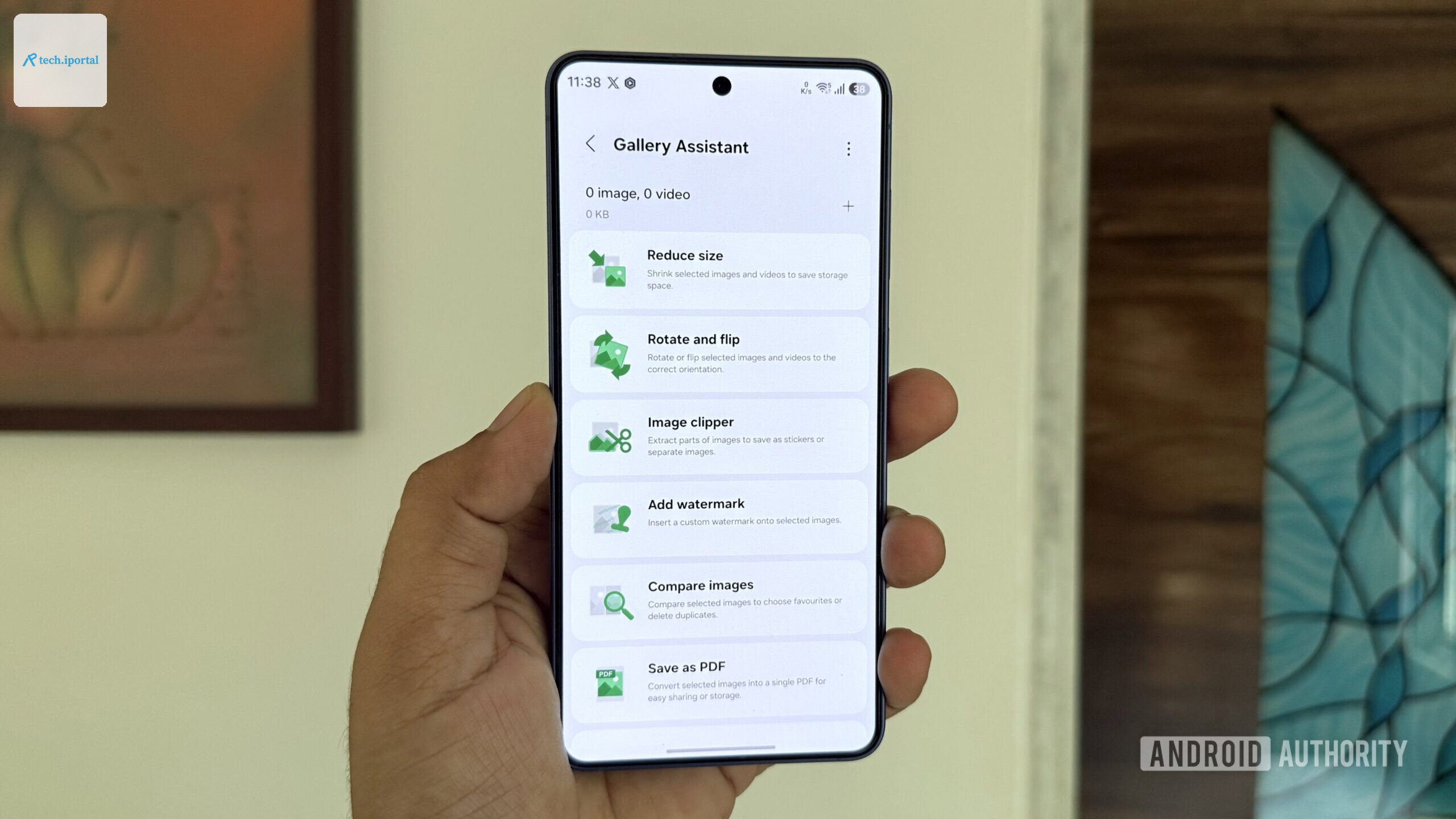 Galaxy phone in hand showing Gallery Assistant app