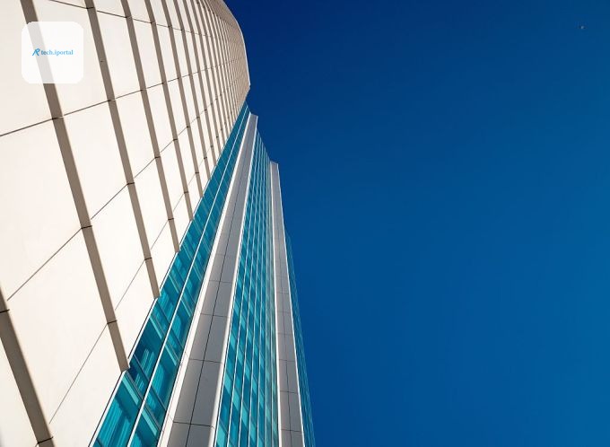 View up the side of the InterContinental Hotel, with a cloudless blue sky, in the South of Market (SOMA) neighborhood of San Francisco, California, 2016.