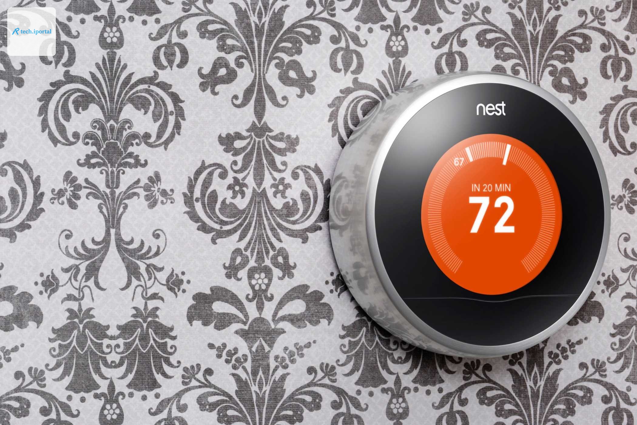 A first-generation Nest learning thermostat in a press image.