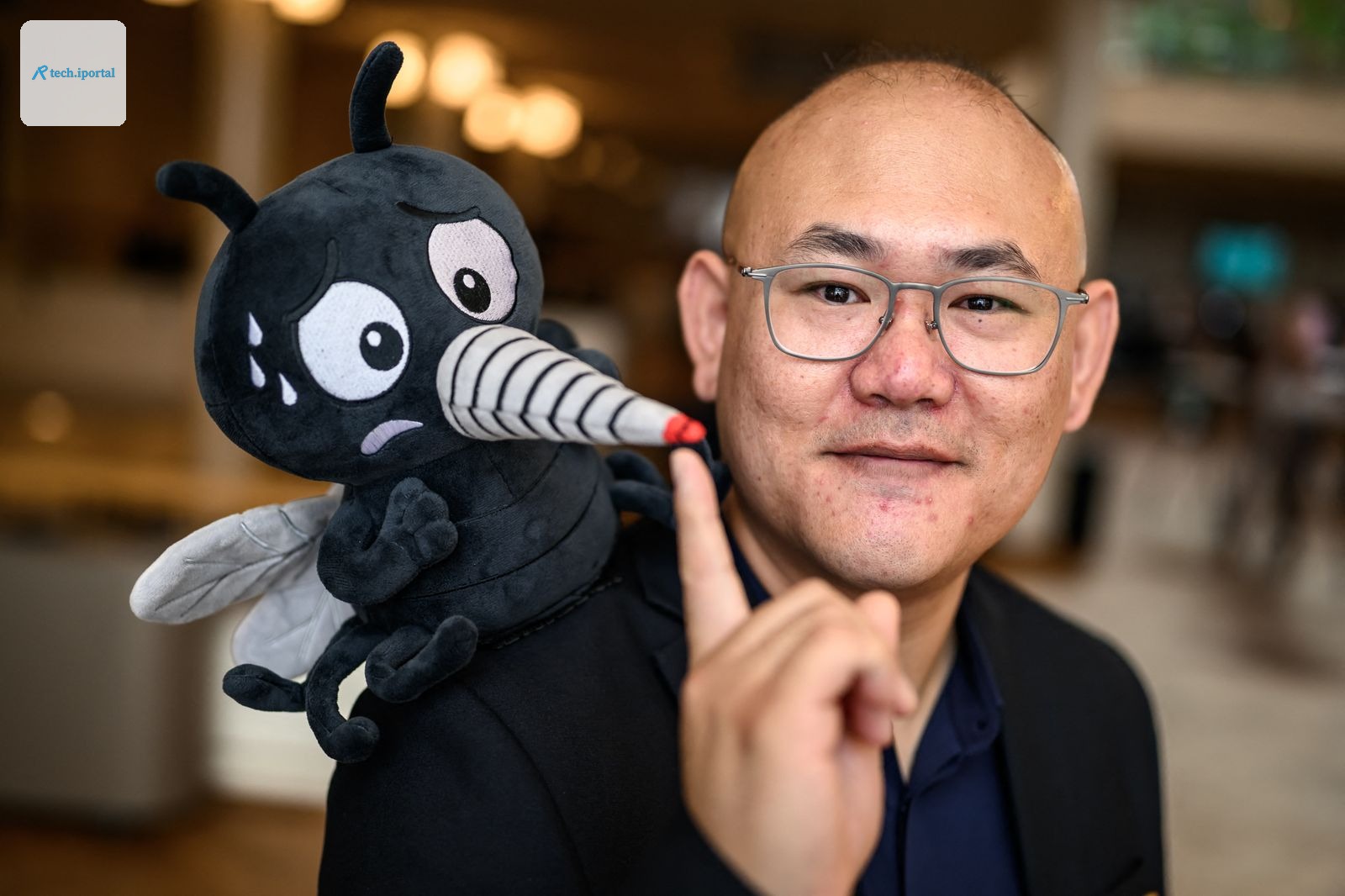 Canadian Associate Professor Changhong Cao poses with a fake moskito ahead of the 2026 Ig Nobel Prize Ceremony in Zurich...