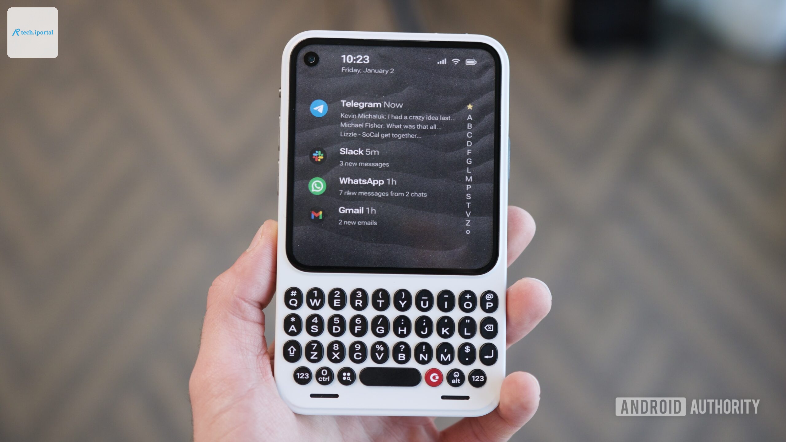 Holding the Clicks Communicator.