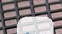 LogSync chips, measuring approximately 4x2 mm.  2026 EPFL/Lundi13 CC BY SA 4.0