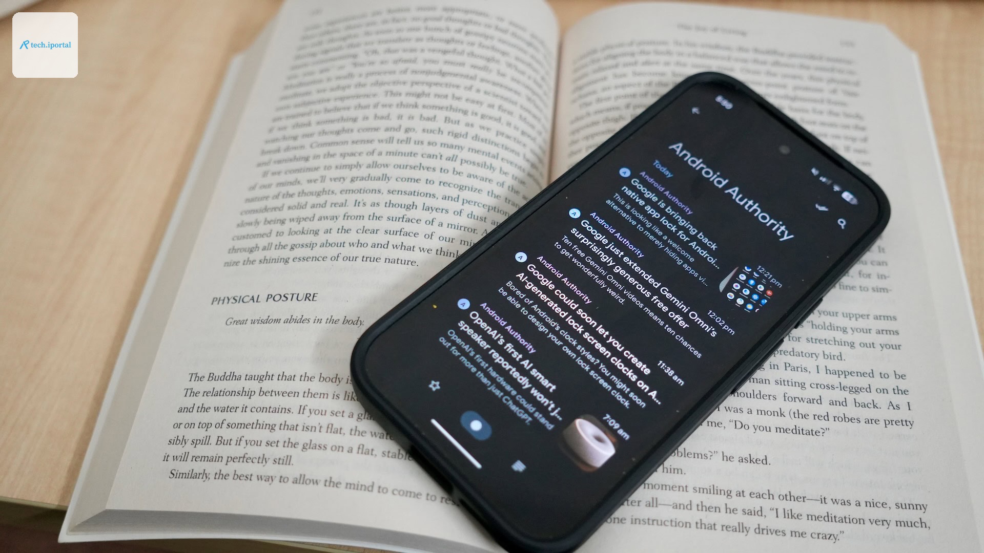 Read You RSS reader shown on top of a paperback book.