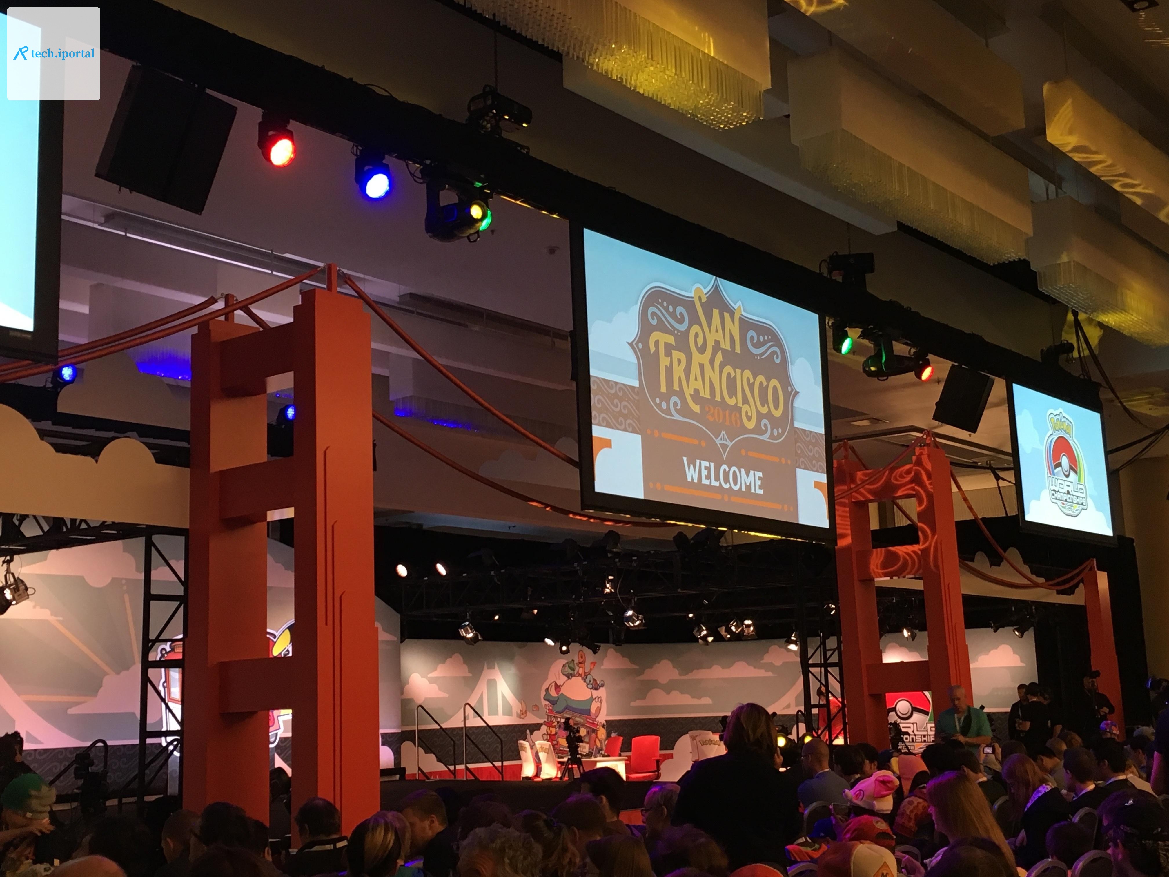 A view of the tournament stage at the 2016 Pokémon World Championships in San Francisco. There are small projection screens for viewing games.