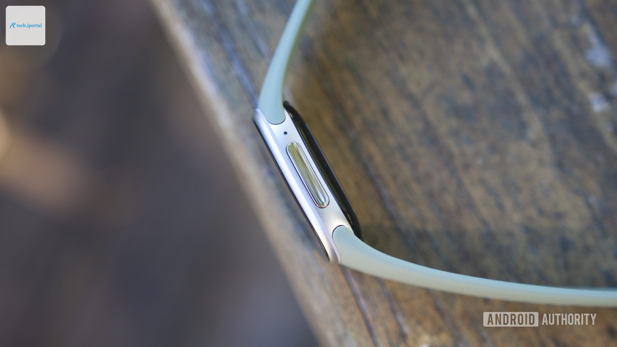 Button on the side of the Fitbit Edge.