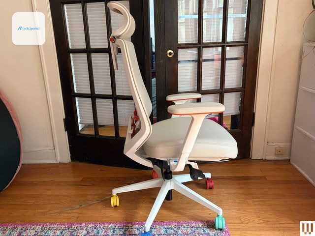 Image may contain Furniture Chair Indoors Office Office Chair Home Decor and Rug
